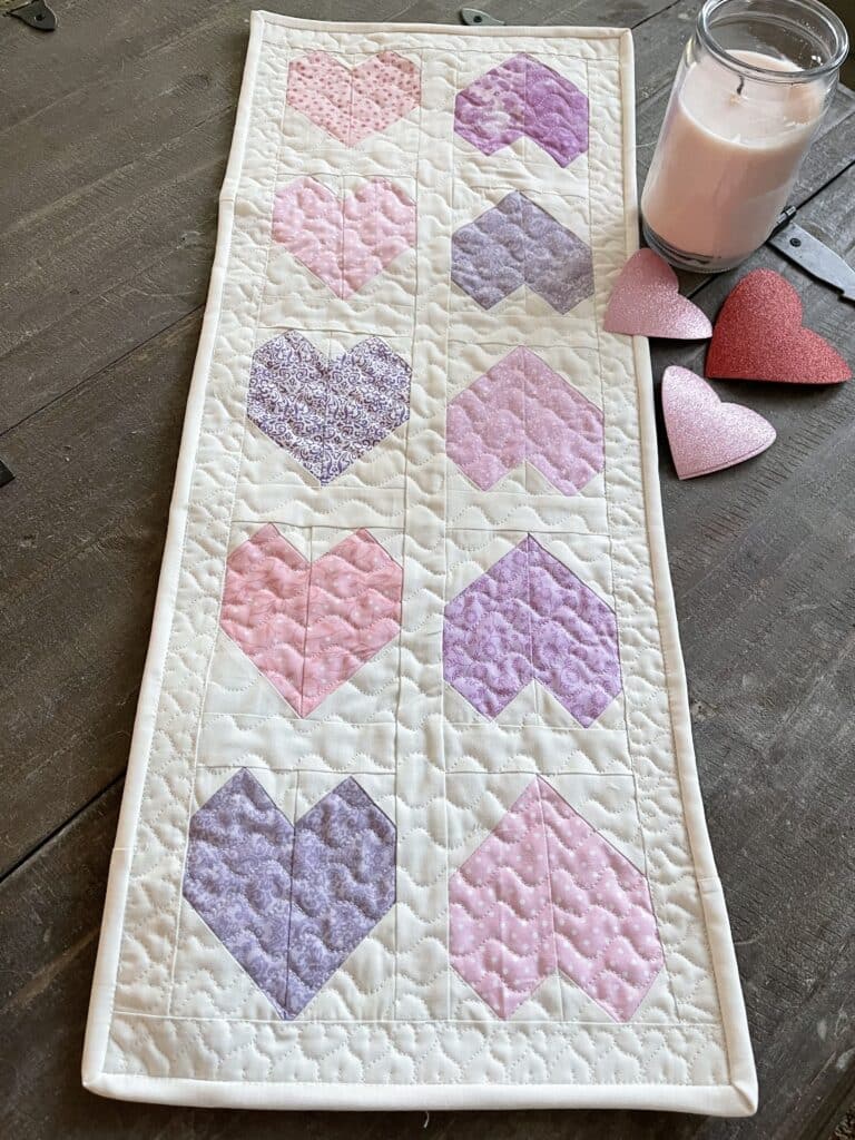Valentine's day quilted table runner.