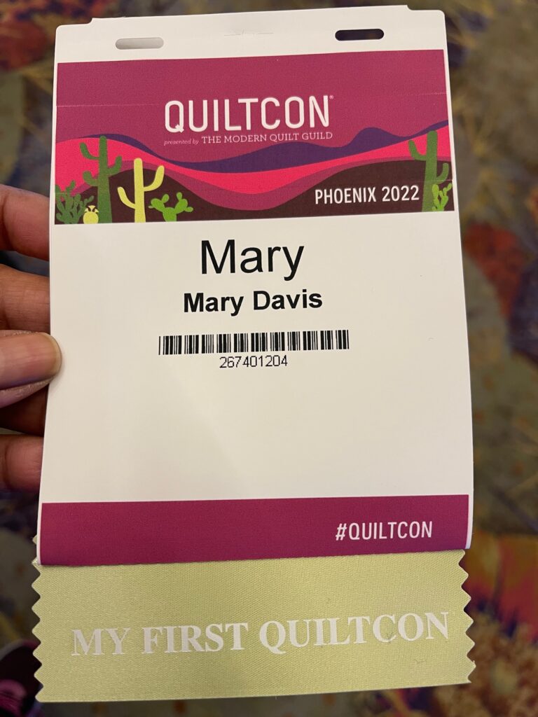 Mary davis's first quiltcon badge.