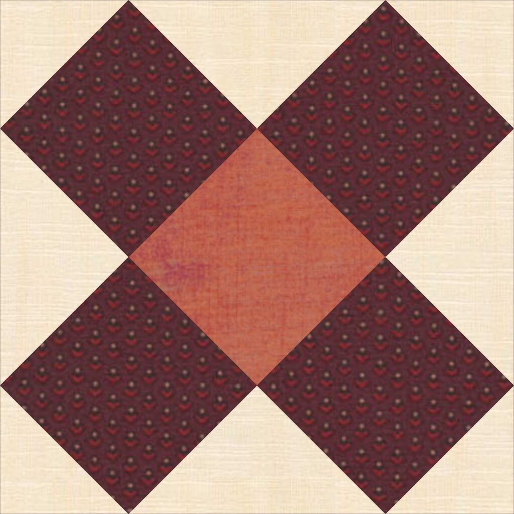 A red and white quilt block with a square in the middle.