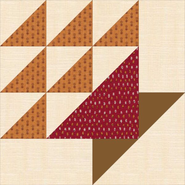 A quilt block with a triangle in the middle.