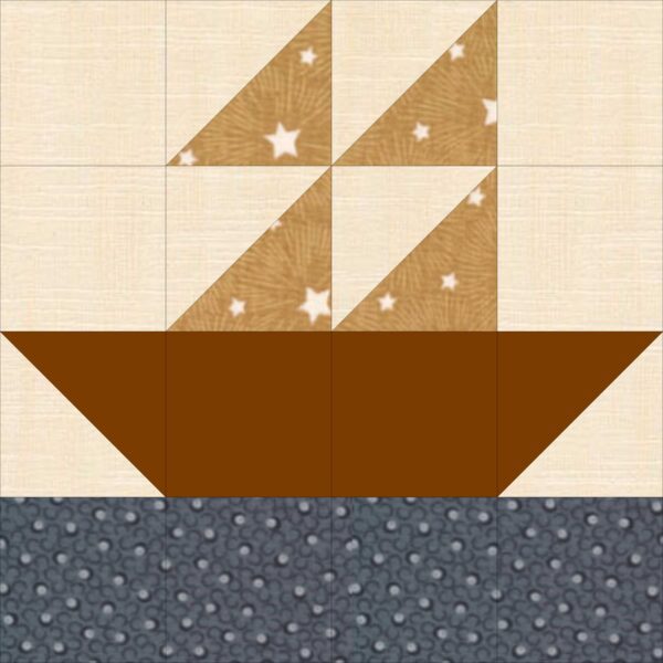 A quilt block with a boat on it.